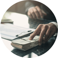 Man offering batch of hundred dollar bills. Hands close up. Venality, bribe, corruption concept. Hand giving money - United States Dollars (or USD). Hand receiving money from businessman.