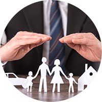Concept of insurance with hands over a house, a car and a family